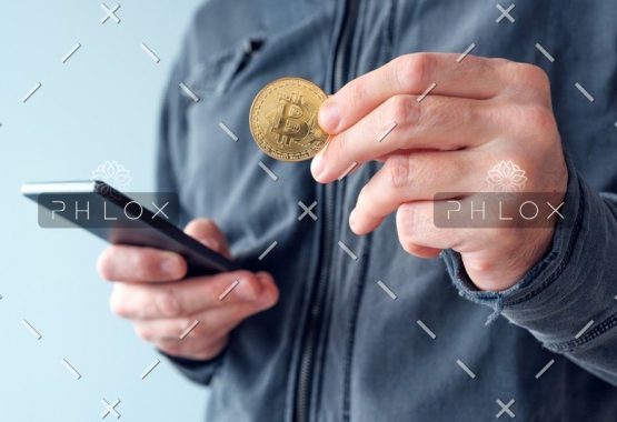 demo-attachment-11-man-with-bitcoin-and-mobile-phone-P8NS7Y4 demo-attachment-11-man-with-bitcoin-and-mobile-phone-P8NS7Y4
